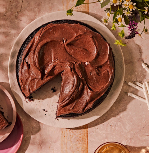 Homemade chocolate cake with swoopy chocolate icing